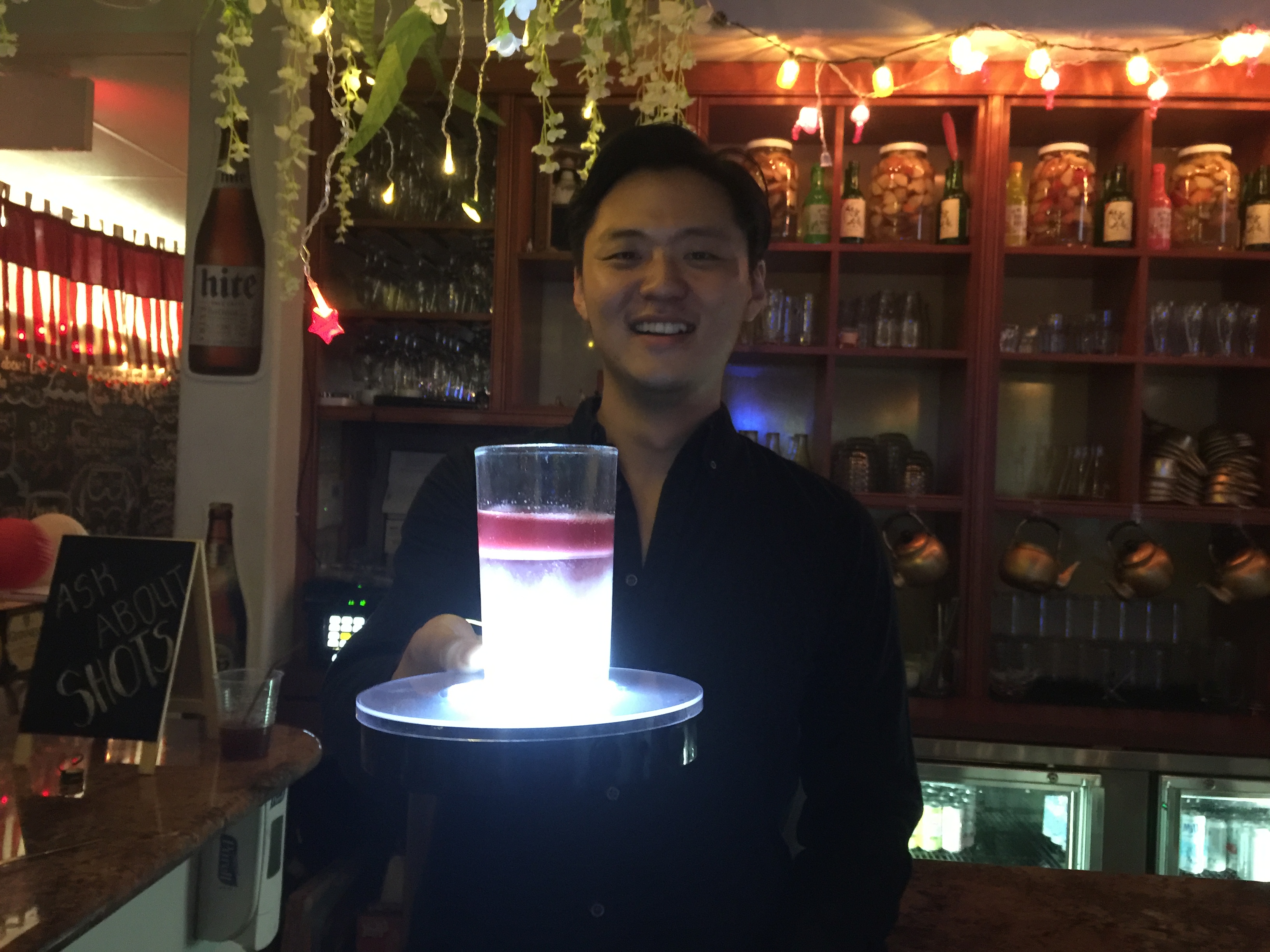 GP Manager Danny serving a Sunrise Shot. Korean Raspberry Soju with some Korean Soda. 