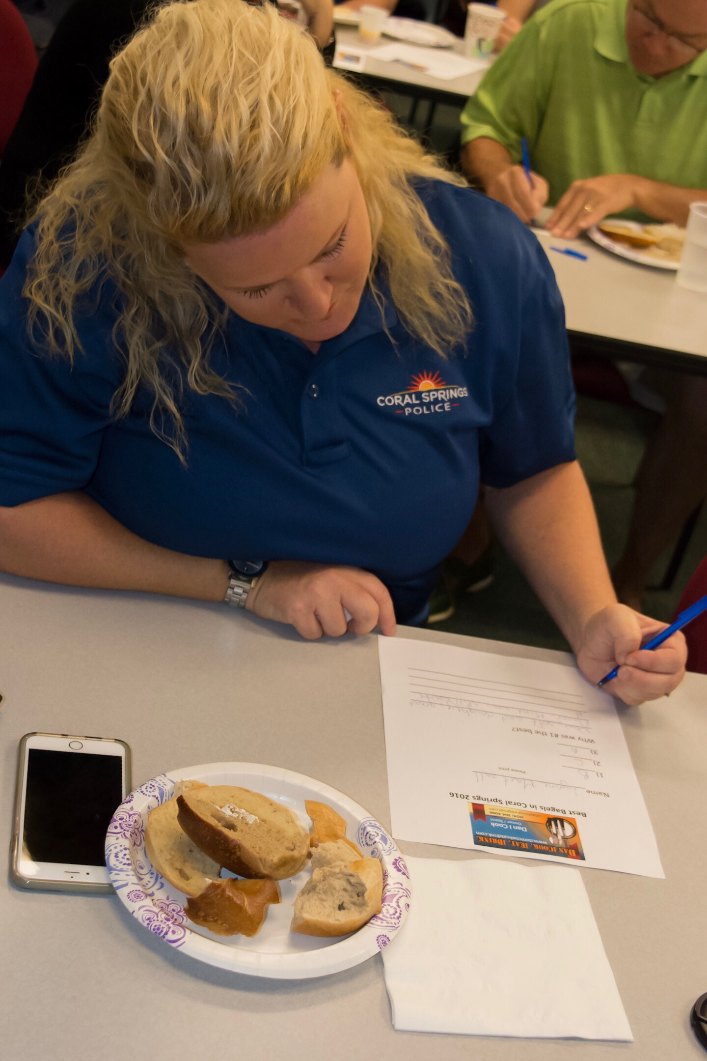 Lynne Martzall filling out the Bagel Ballot.